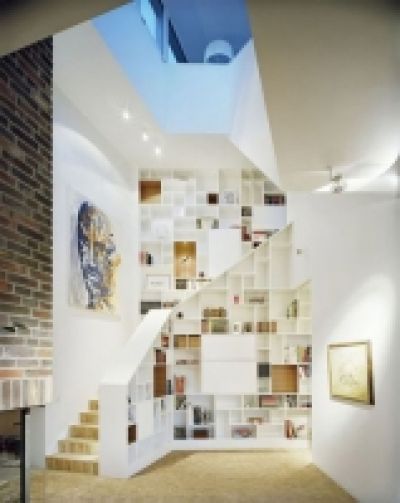 Turn the area around the stairs into a bookcase